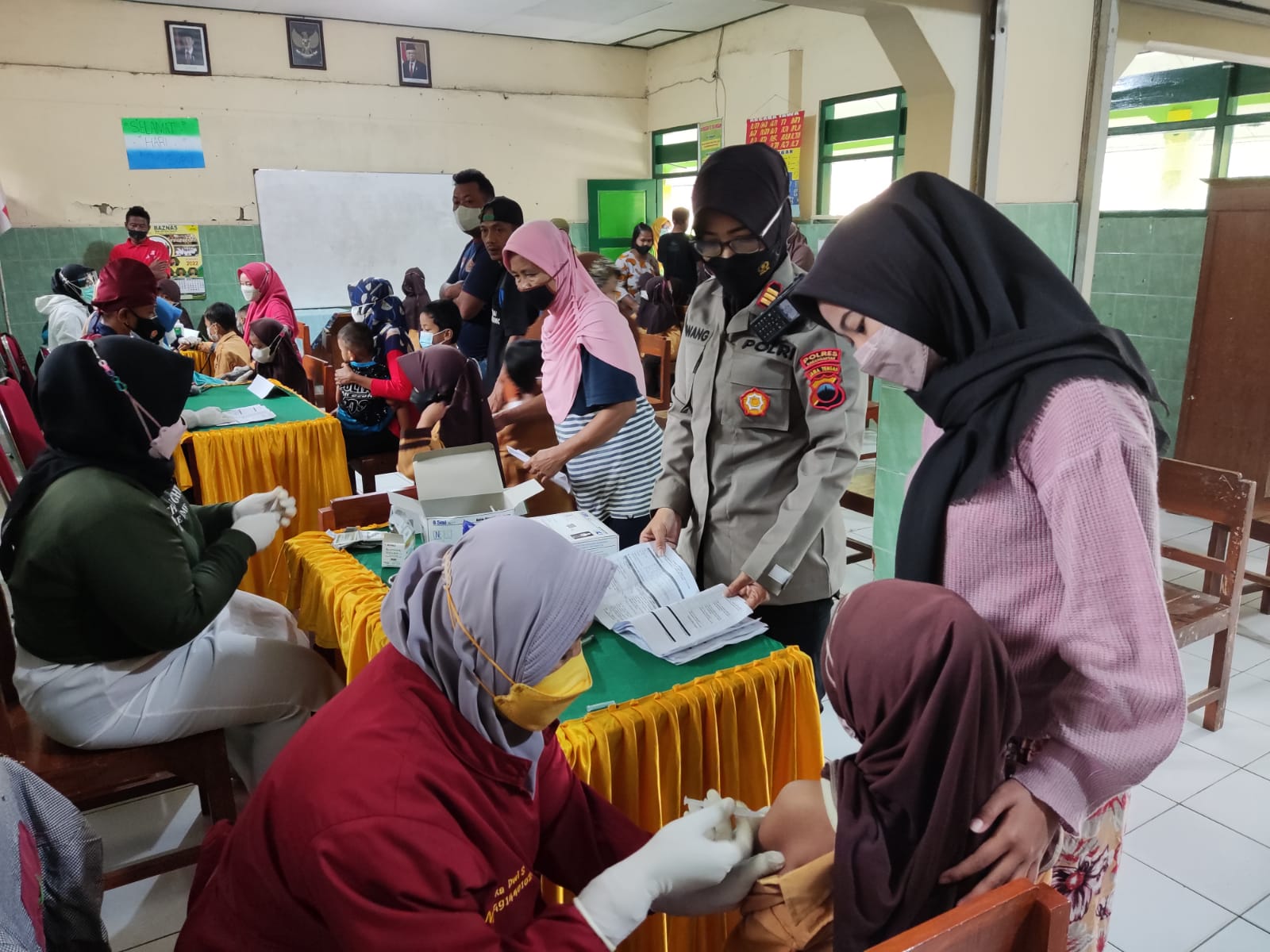 UEWS volunteers working with students in the community